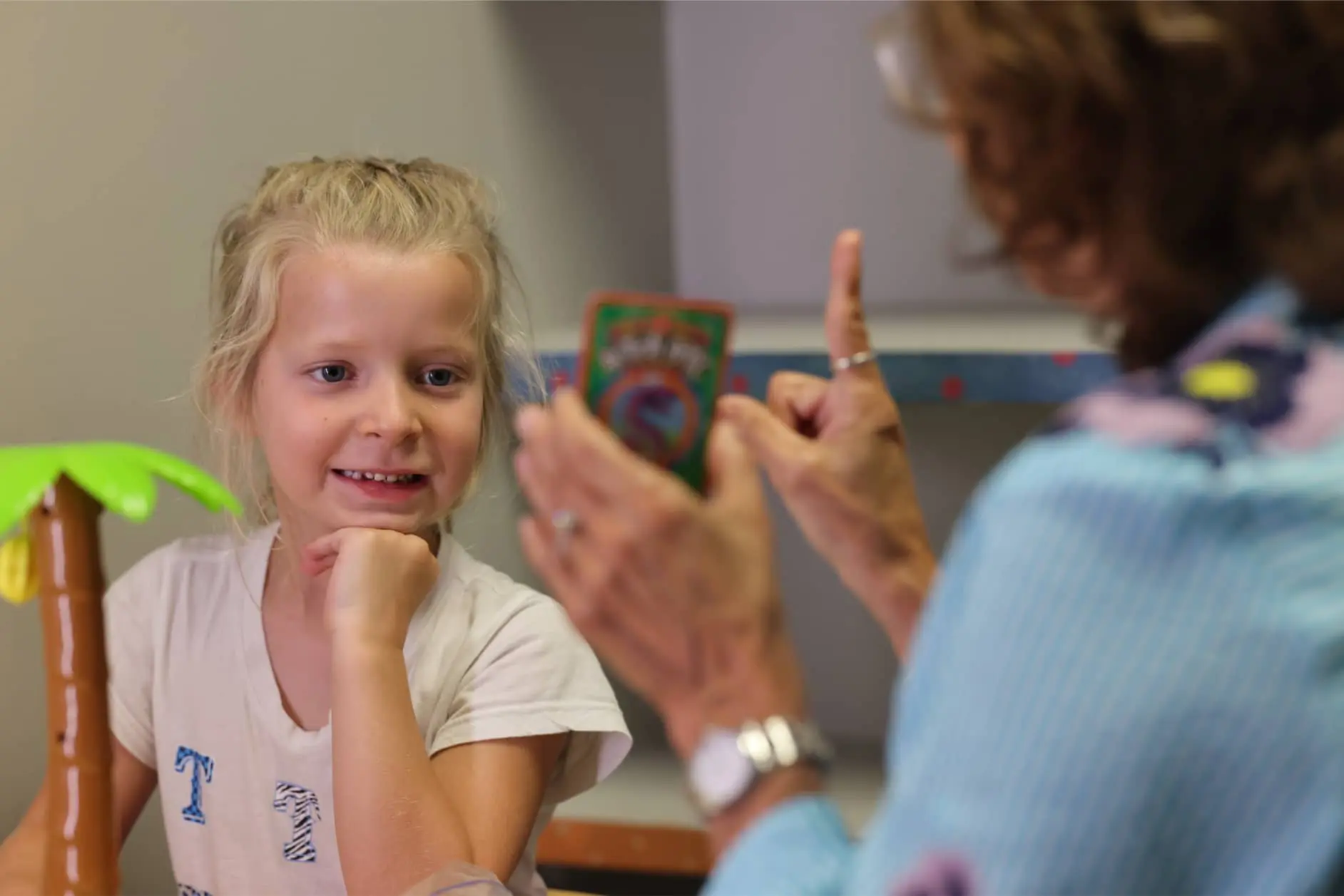 A young girl working on improving her speech with the Articulation Disorder services at Bliss Speech and Hearing Services