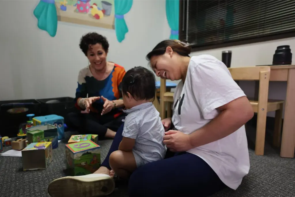 A child with hearing loss improving his language skills with auditory verbal therapy at Bliss Speech and Hearing Services.