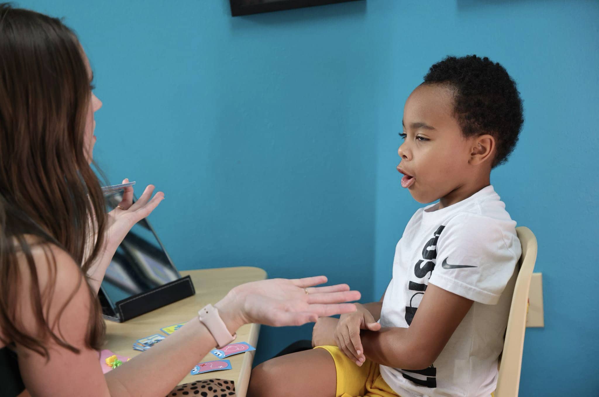 A young boy improving his speech with receptive/expressive language disorder services at Bliss Speech and Hearing Services.